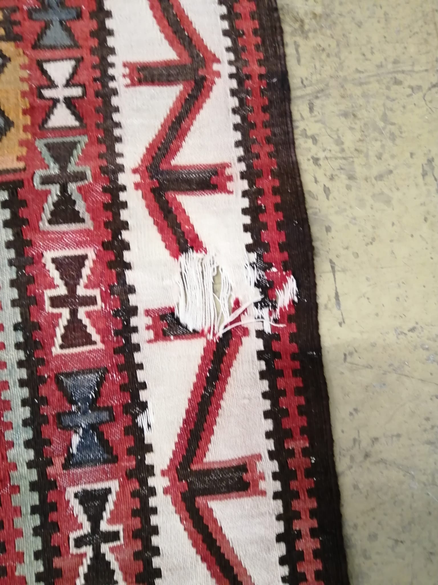 An antique Caucasian Kilim, 292 x 175cm